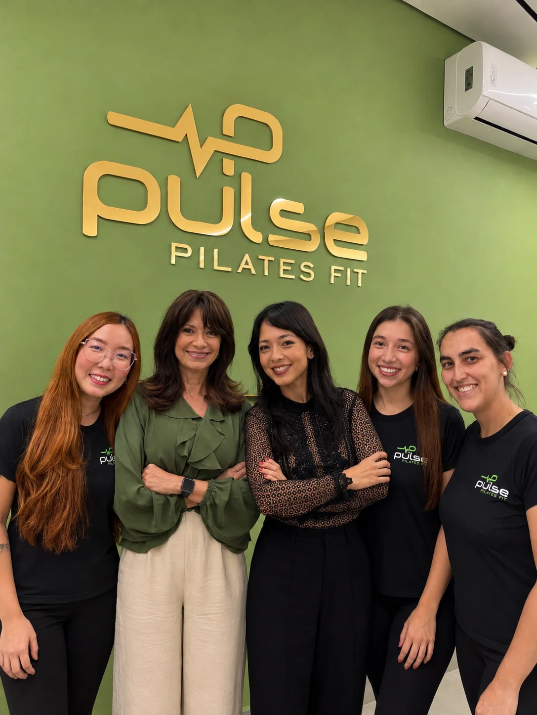 Equipe do Pulse Pilates Fit reunida no estúdio